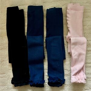 RuffleButts Set of Four Ruffled Footless Tights - Black, Blue, Pink